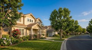Brea, California suburban homes in bright June morning light, editorial housing-market illustration.