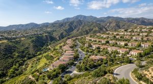 Anaheim Hills homes terraced along the Santa Ana Canyon foothills, editorial market view.